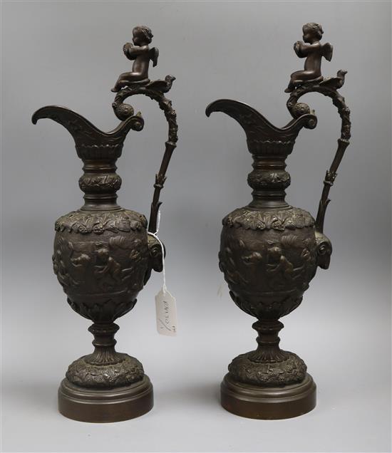 A pair of bronze ewers height 43.5cm